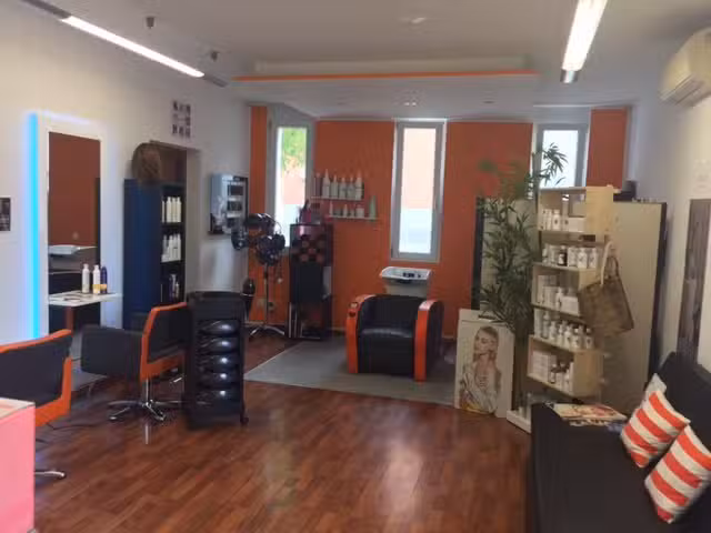 Infinity Coiffure Unisex